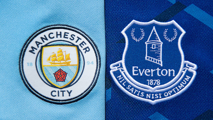 The Manchester City and Everton Club Badges