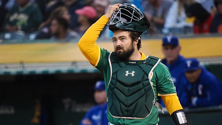Sep 25, 2024; Oakland, California, USA; Oakland Athletics catcher Shea Langeliers (23) between plays against the Texas Rangers during the first inning at Oakland-Alameda County Coliseum. Mandatory Credit: Kelley L Cox-Imagn Images