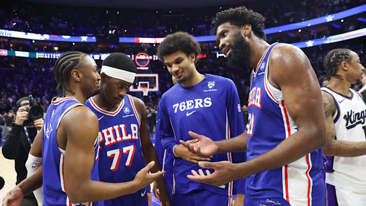 Jan 29, 2026; Philadelphia, Pennsylvania, USA; Philadelphia 76ers center Joel Embiid (21) reacts with Philadelphia 76ers guard Tyrese Maxey (L) in front of guard Vj Edgecombe (77) after a victory against the Sacramento Kings at Xfinity Mobile Arena. Mandatory Credit: Bill Streicher-Imagn Images Jan 29, 2026; Philadelphia, Pennsylvania, USA; Philadelphia 76ers center Joel Embiid (21) reacts with Philadelphia 76ers guard Tyrese Maxey (L) in front of guard Vj Edgecombe (77) after a victory against the Sacramento Kings at Xfinity Mobile Arena. Mandatory Credit: Bill Streicher-Imagn Images