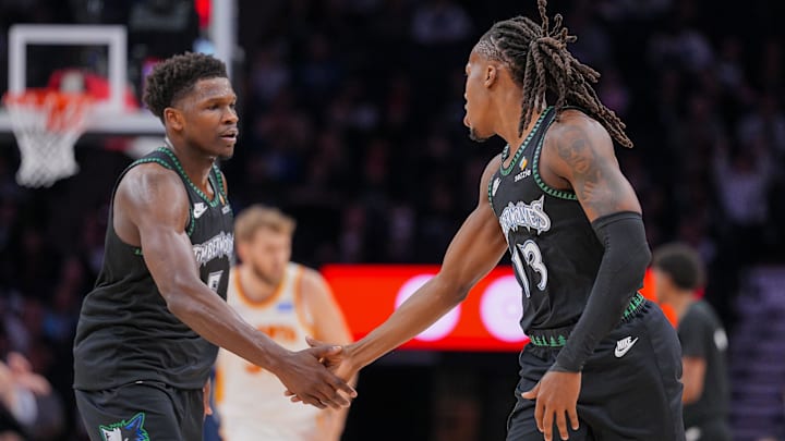 Feb 9, 2026; Minneapolis, Minnesota, USA; Minnesota Timberwolves guard Anthony Edwards (5) and guard Ayo Dosunmu (13) celebrate against the Atlanta Hawks in the second quarter at Target Center.