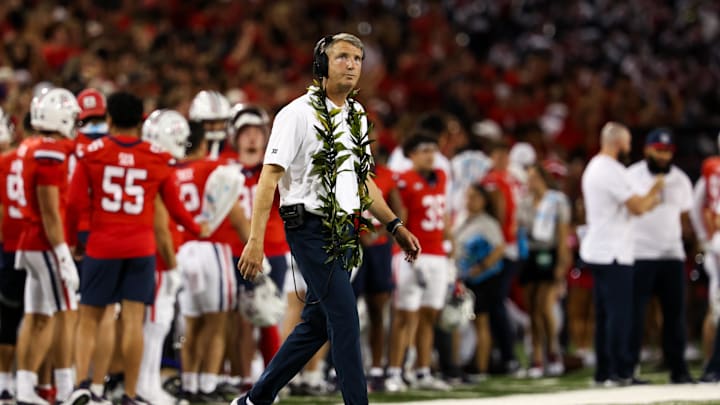 Sep 7, 2024; Tucson, Arizona, USA; Arizona Wildcats head coach Brent Brennan looks at score board against the Northern Arizona Lumberjacks during first quarter at Arizona Stadium. Mandatory Credit: Aryanna Frank-Imagn Images