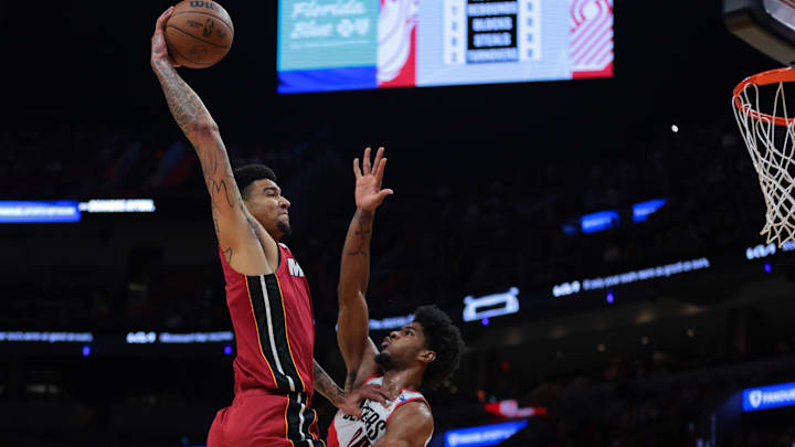 Jan 21, 2025; Miami, Florida, USA; Miami Heat center Kel'el Ware (7) dunks over Portland Trail Blazers guard Scoot Henderson (00) during the first quarter at Kaseya Center. Mandatory Credit: Sam Navarro-Imagn Images Jan 21, 2025; Miami, Florida, USA; Miami Heat center Kel'el Ware (7) dunks over Portland Trail Blazers guard Scoot Henderson (00) during the first quarter at Kaseya Center. Mandatory Credit: Sam Navarro-Imagn Images