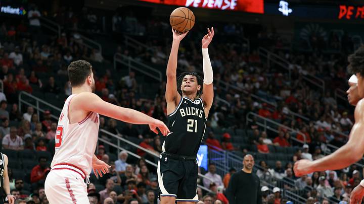 Apr 1, 2026; Houston, Texas, USA; Milwaukee Bucks forward Ousmane Dieng (21) shoots the ball during the fourth quarter against the Houston Rockets at Toyota Center. Mandatory Credit: Troy Taormina-Imagn Images