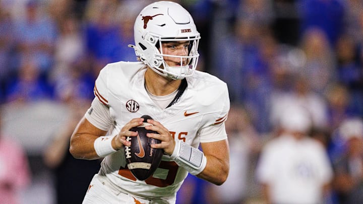 Oct 18, 2025; Lexington, Kentucky, USA; Texas Longhorns quarterback Arch Manning (16) looks for an open receiver during the first quarter against the Kentucky Wildcats at Kroger Field. Mandatory Credit: Jordan Prather-Imagn Images
