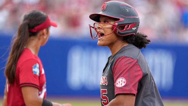 Oklahoma's Ella Parker (5) celebrates a single in sixth inning of the Women's College World Series softball game between the Texas Tech Raiders and the Oklahoma Sooners at Devon Park in Oklahoma City, Monday, June, 2, 2025.