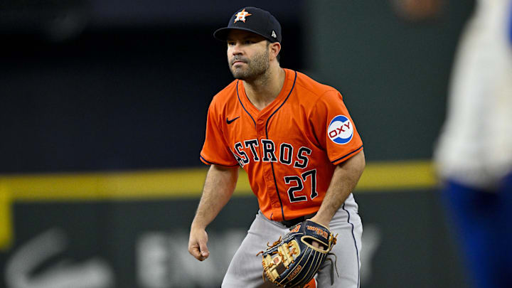 Aug 7, 2024; Arlington, Texas, USA; Houston Astros second baseman Jose Altuve (27) in action during the game between the Texas Rangers and the Houston Astros at Globe Life Field.