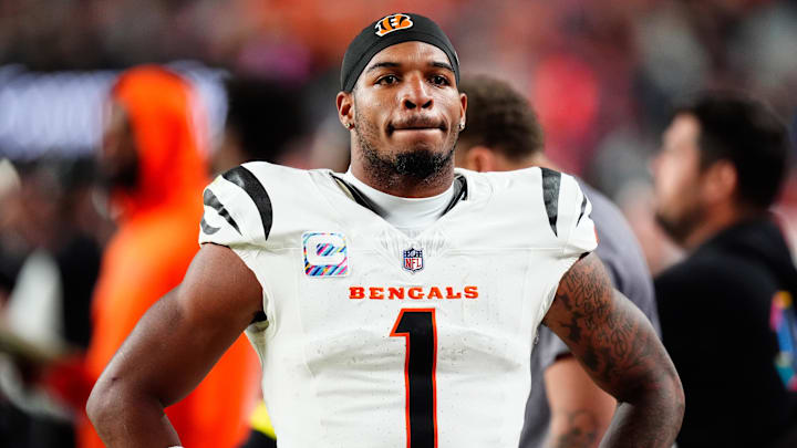 Sep 29, 2025; Denver, Colorado, USA; Cincinnati Bengals wide receiver Ja'Marr Chase (1) looks on after the game against the Denver Broncos at Empower Field at Mile High. Mandatory Credit: Ron Chenoy-Imagn Images