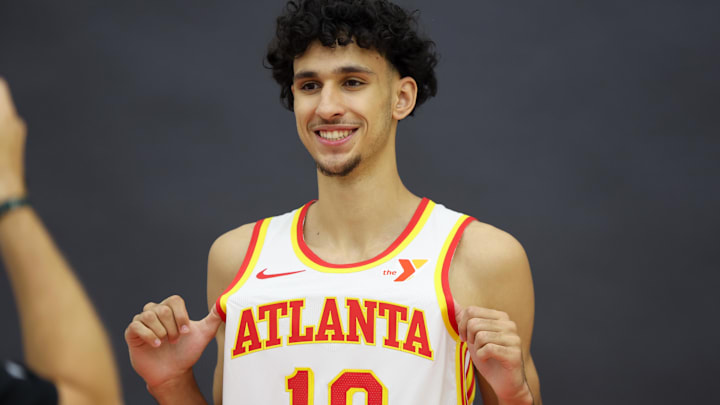 Jun 28, 2024; Atlanta, Georgia, USA; Atlanta Hawks first overall draft pick Zaccharie Risacher (10) poses for a photo at the Emory Sports Medicine Complex. Mandatory Credit: Brett Davis-Imagn Images