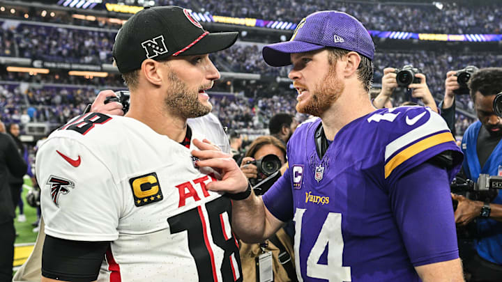 Dec 8, 2024; Minneapolis, Minnesota, USA; Atlanta Falcons quarterback Kirk Cousins (18) and Minnesota Vikings quarterback Sam Darnold (14) talk after the game at U.S. Bank Stadium. Dec 8, 2024; Minneapolis, Minnesota, USA; Atlanta Falcons quarterback Kirk Cousins (18) and Minnesota Vikings quarterback Sam Darnold (14) talk after the game at U.S. Bank Stadium.