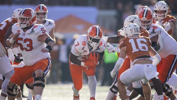 Dec 21, 2024; Austin, Texas, USA; Clemson Tigers running back Phil Mafah (7) against the Texas Longhorns during the first half of the CFP National playoff first round at Darrell K Royal-Texas Memorial Stadium. 