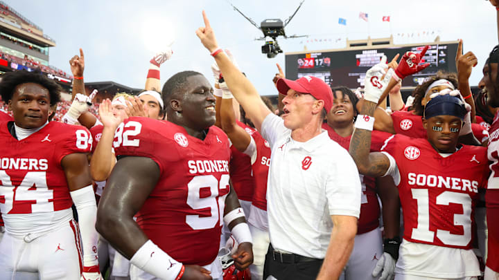 Oklahoma Sooners head coach Brent Venables celebrates with his team after the Auburn game.