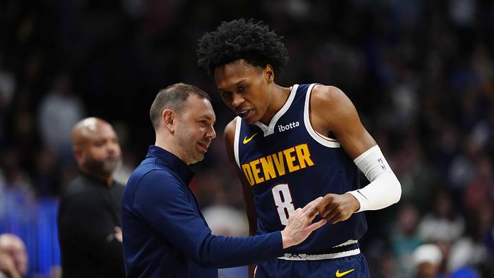 Jan 27, 2026; Denver, Colorado, USA; Denver Nuggets guard Peyton Watson (8) talks to head coach David Adelman during the first quarter against the Detroit Pistons at Ball Arena. Jan 27, 2026; Denver, Colorado, USA; Denver Nuggets guard Peyton Watson (8) talks to head coach David Adelman during the first quarter against the Detroit Pistons at Ball Arena.