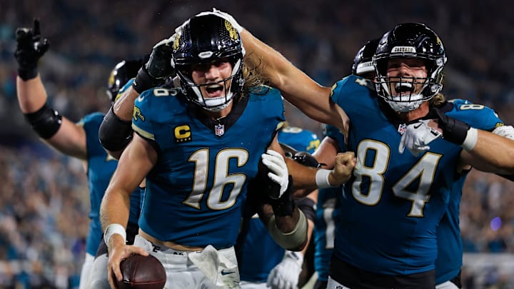 Jacksonville Jaguars quarterback Trevor Lawrence (16) celebrates his game-winning touchdown as tight end Hunter Long (84) reacts during the fourth quarter of an NFL football matchup at EverBank Stadium, Monday, Oct. 6, 2025, in Jacksonville, Fla. The Jacksonville Jaguars edged the Kansas City Chiefs 31-28. [Corey Perrine/Florida Times-Union]