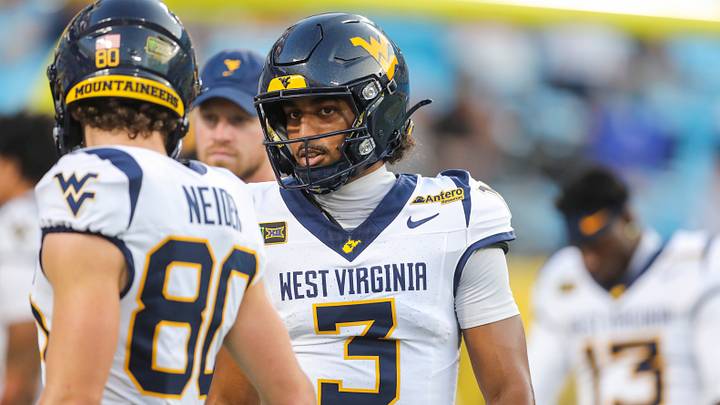 Sep 19, 2026; Charlotte, North Carolina, USA; West Virginia Mountaineers quarterback Michael Hawkins Jr. (3) warms up before their game against the Virginia Cavaliers at Bank of America Stadium. Mandatory Credit: Ben Queen-Imagn Images
