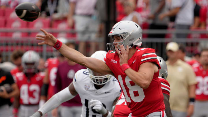 August 31, 2024; Columbus, Ohio, USA;
Ohio State Buckeyes quarterback Will Howard (18) throws a pass during the first half of Saturday’s NCAA Division I football game against the Akron Zips at Ohio Stadium. August 31, 2024; Columbus, Ohio, USA;
Ohio State Buckeyes quarterback Will Howard (18) throws a pass during the first half of Saturday’s NCAA Division I football game against the Akron Zips at Ohio Stadium.
