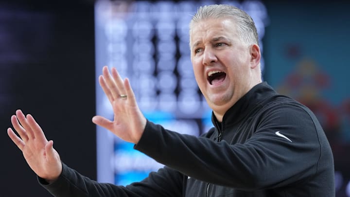Purdue Boilermakers head coach Matt Painter yells down court Purdue Boilermakers head coach Matt Painter yells down court