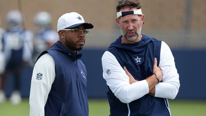 Dallas Cowboys defensive coordinator Christian Parker with head coach Brian Schottenheimer at training camp at River Ridge Playing Fields. Dallas Cowboys defensive coordinator Christian Parker with head coach Brian Schottenheimer at training camp at River Ridge Playing Fields.