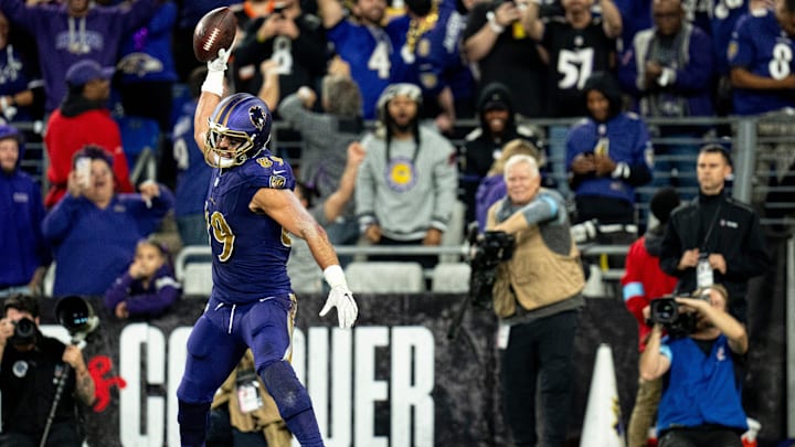 Baltimore Ravens tight end Mark Andrews spikes the ball after scoring a touchdown.