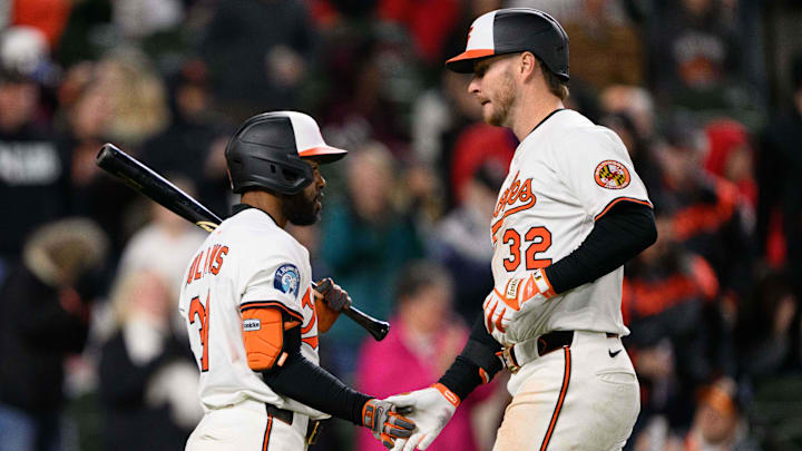 Apr 16, 2025; Baltimore, Maryland, USA; Baltimore Orioles first baseman Ryan O'Hearn (32) and outfielder Cedric Mullins (31) celebrate during the eighth inning against the Cleveland Guardians at Oriole Park at Camden Yards. Apr 16, 2025; Baltimore, Maryland, USA; Baltimore Orioles first baseman Ryan O'Hearn (32) and outfielder Cedric Mullins (31) celebrate during the eighth inning against the Cleveland Guardians at Oriole Park at Camden Yards.