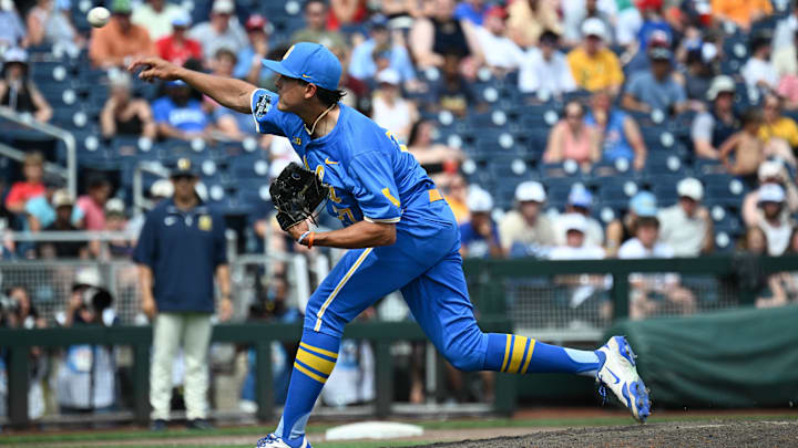 Jun 14, 2025; Omaha, Neb, USA;  UCLA Bruins pitcher Easton Hawk (27) throws against the Murray State Racers during the ninth inning at Charles Schwab Field. Mandatory Credit: Steven Branscombe-Imagn Images