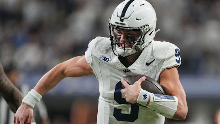Penn State Nittany Lions quarterback Beau Pribula (9) rushes up the field Sunday, Dec. 8, 2024, during the Big Ten Championship game at Lucas Oil Stadium in Indianapolis. The Oregon Ducks defeated the Penn State Nittany Lions, 45-37.