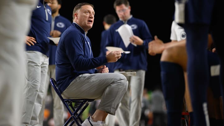 Penn State coach Mike Rhoades speaks to the Nittany Lions during a 2024 game against Virginia Tech.
