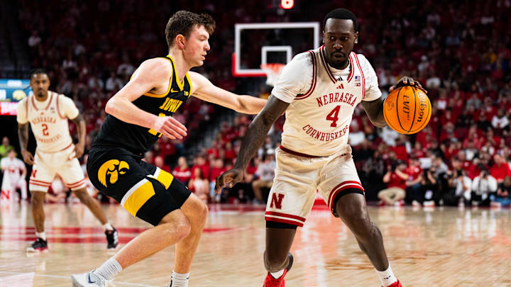 Nebraska forward Juwan Gary drives against Iowa forward Pryce Sandfort during the first half.