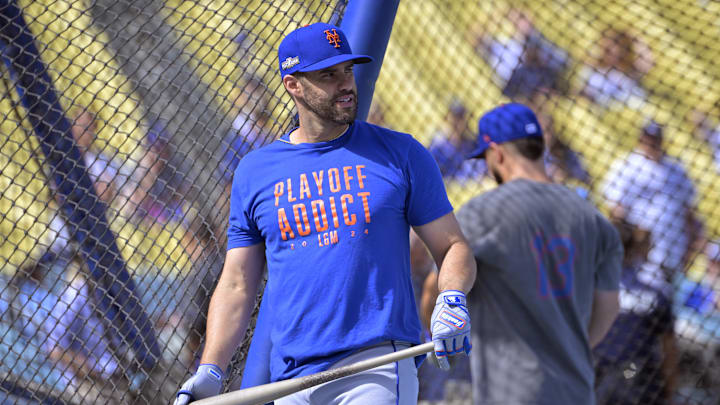 Oct 14, 2024; Los Angeles, California, USA; New York Mets designated hitter J.D. Martinez (28) warms up before game two against the Los Angeles Dodgers in the NLCS for the 2024 MLB Playoffs at Dodger Stadium. Mandatory Credit: Jayne Kamin-Oncea-Imagn Images Oct 14, 2024; Los Angeles, California, USA; New York Mets designated hitter J.D. Martinez (28) warms up before game two against the Los Angeles Dodgers in the NLCS for the 2024 MLB Playoffs at Dodger Stadium. Mandatory Credit: Jayne Kamin-Oncea-Imagn Images