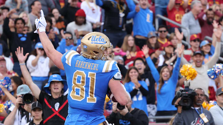 Nov 18, 2023; Los Angeles, California, USA; UCLA Bruins tight end Hudson Habermehl (81) celebrates after a touchdown during the first quarter against the USC Trojans at United Airlines Field at Los Angeles Memorial Coliseum. Mandatory Credit: Jason Parkhurst-Imagn Images