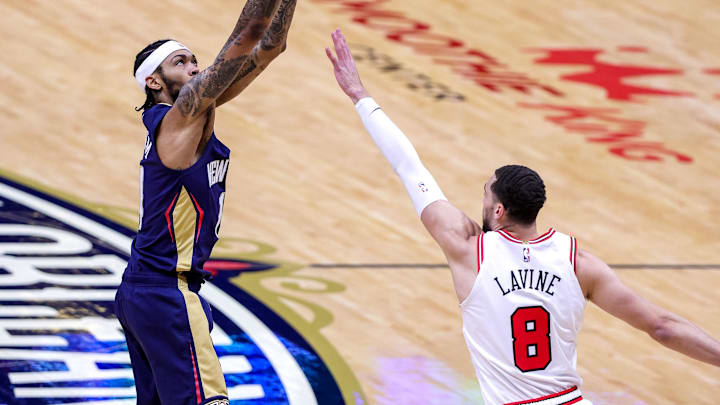 Mar 3, 2021; New Orleans, Louisiana, USA;  New Orleans Pelicans forward Brandon Ingram (14) shoots a shot over Chicago Bulls guard Zach LaVine (8) during the first half at Smoothie King Center. Mandatory Credit: Stephen Lew-Imagn Images