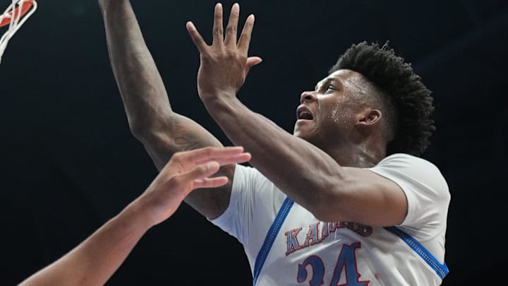 Jan 28, 2025; Lawrence, Kansas, USA; Kansas Jayhawks forward KJ Adams Jr. (24) shoots against the UCF Knights during the second half at Allen Fieldhouse. Mandatory Credit: Denny Medley-Imagn Images