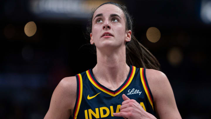 Fever guard Caitlin Clark looks up at the scoreboard on Sunday during a game against the Chicago Sky at Gainbridge Fieldhouse.