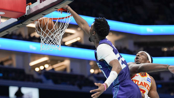 Charlotte Hornets forward Brandon Miller (24) makes a slam dunk 