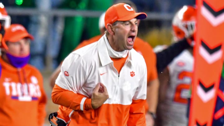 Nov 7, 2020; South Bend, Indiana, USA; Clemson Tigers head coach Dabo Swinney yells from the bench in the fourth quarter agains the Notre Dame Fighting Irish at Notre Dame Stadium. Notre Dame defeated Clemson 47-40 in two overtimes. Mandatory Credit: Matt Cashore-Imagn Images