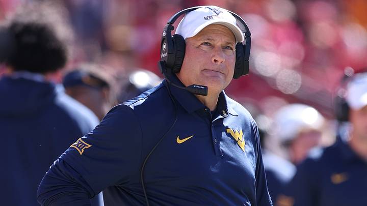 Oct 3, 2026; Ames, Iowa, USA; West Virginia Mountaineers head coach Rich Rodriguez watches his team play the Iowa State Cyclones during the second half at Jack Trice Stadium. Mandatory Credit: Reese Strickland-Imagn Images Oct 3, 2026; Ames, Iowa, USA; West Virginia Mountaineers head coach Rich Rodriguez watches his team play the Iowa State Cyclones during the second half at Jack Trice Stadium. Mandatory Credit: Reese Strickland-Imagn Images