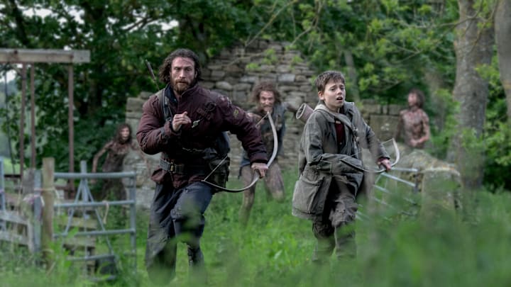 Jamie (Aaron Taylor-Johnson) and his son Spike (Alfie Williams) in Columbia Pictures' 28 YEARS LATER.