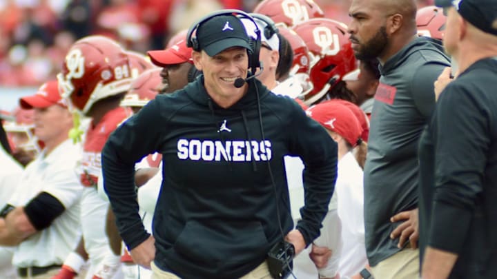 Oklahoma coach Brent Venables smiles on the sideline at Gaylord Family-Oklahoma Memorial Stadium.