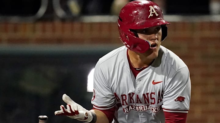Arkansas second baseman Cam Kozeal (8) runs to first base on a 2-RBI single against Vanderbilt during the ninth inning at Hawkins Field in Nashville, Tenn., Friday, March 28, 2025.