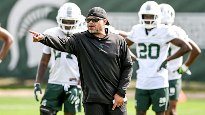 Michigan State's cornerbacks coach Demetrice Martin works with players during the first day of football camp on Tuesday, July 30, 2024, in East Lansing.