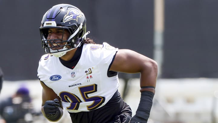 Jun 11, 2025; Baltimore, MD, USA; Baltimore Ravens linebacker Tavius Robinson (95) runs during an NFL OTA at Under Armour Performance Center. Mandatory Credit: Daniel Kucin Jr.-Imagn Images