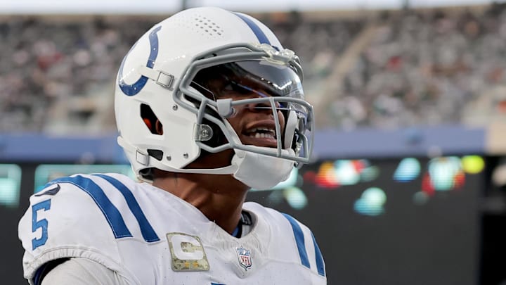 Indianapolis Colts quarterback Anthony Richardson (5) celebrates his touchdown against the New York Jets during the fourth quarter at MetLife Stadium. Indianapolis Colts quarterback Anthony Richardson (5) celebrates his touchdown against the New York Jets during the fourth quarter at MetLife Stadium.