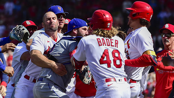 Apr 27, 2022; St. Louis, Missouri, USA;  Benches clear as St. Louis Cardinals designated hitter Nolan Arenado (28) reacts with New York Mets catcher Tomas Nido (3) and relief pitcher Yoan Lopez (44) after a high and tight pitch during the eighth inning at Busch Stadium. Arenado was ejected from the game. Mandatory Credit: Jeff Curry-Imagn Images