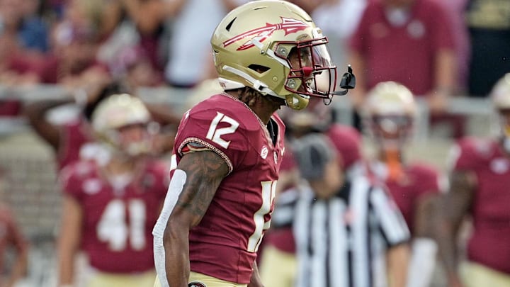 Oct 7, 2023; Tallahassee, Florida, USA; Florida State Seminoles defensive back Conrad Hussey (12) celebrates after a tackle against Virginia Tech Hokies running back Bhayshul Tuten (not pictured) during the second half against the at Doak S. Campbell Stadium. Mandatory Credit: Melina Myers-Imagn Images