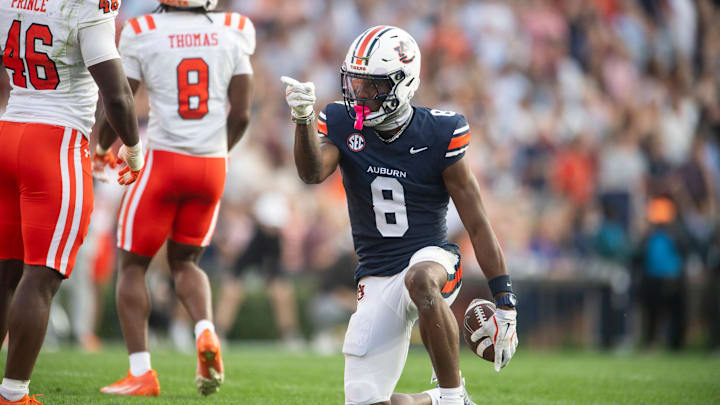 Auburn Tigers wide receiver Cam Coleman (8) celebrates a first down as Auburn Tigers take on Mercer Bears at Jordan-Hare Stadium in Auburn, Ala. on Saturday, Nov. 22, 2025. Auburn Tigers defeated the Mercer Bears 62-17. Auburn Tigers wide receiver Cam Coleman (8) celebrates a first down as Auburn Tigers take on Mercer Bears at Jordan-Hare Stadium in Auburn, Ala. on Saturday, Nov. 22, 2025. Auburn Tigers defeated the Mercer Bears 62-17.