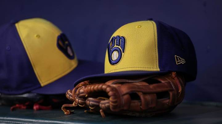 Jul 28, 2023; Atlanta, Georgia, USA; A detailed view of a Milwaukee Brewers hat and glove on the bench against the Atlanta Braves in the second inning at Truist Park. Mandatory Credit: Brett Davis-Imagn Images Jul 28, 2023; Atlanta, Georgia, USA; A detailed view of a Milwaukee Brewers hat and glove on the bench against the Atlanta Braves in the second inning at Truist Park. Mandatory Credit: Brett Davis-Imagn Images