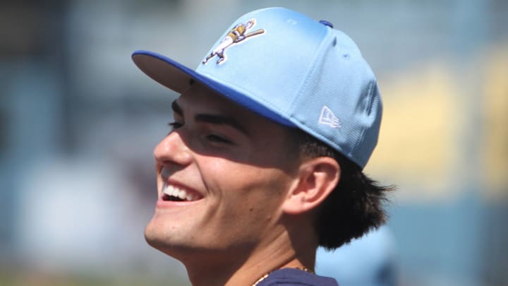 Milwaukee Brewers 2025 first-rounder Brady Ebel takes the field at Dodger Stadium after signing his first pro contract on July 19, 2025.