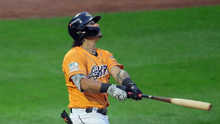 RubberDucks designated hitter Ralphy Velazquez watches his shot down the first-base line during a game Aug. 21, 2025, in Akron.
