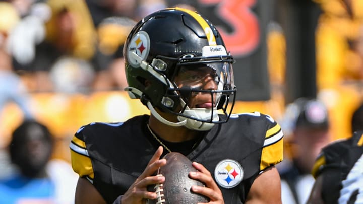 Pittsburgh Steelers quarterback Justin Fields looks to throw a pass.