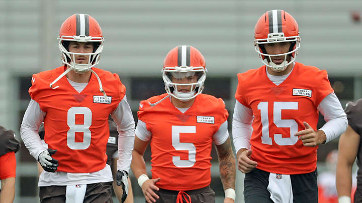 Cleveland Browns quarterbacks Kenny Pickett, left, Dillon Gabriel, center, and Joe Flacco warm up during an NFL practice at the Cleveland Browns training facility on Wednesday, May 28, 2025, in Berea, Ohio. Cleveland Browns quarterbacks Kenny Pickett, left, Dillon Gabriel, center, and Joe Flacco warm up during an NFL practice at the Cleveland Browns training facility on Wednesday, May 28, 2025, in Berea, Ohio.