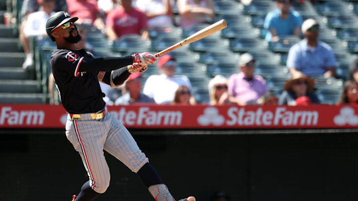 Sep 10, 2025; Anaheim, California, USA; Minnesota Twins designated hitter Byron Buxton (25) hits a two-run home run during the sixth inning against the Los Angeles Angels at Angel Stadium. Sep 10, 2025; Anaheim, California, USA; Minnesota Twins designated hitter Byron Buxton (25) hits a two-run home run during the sixth inning against the Los Angeles Angels at Angel Stadium.
